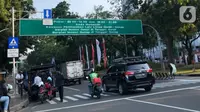 Aturan ganjil genap Jakarta berlaku pada hari ini, Rabu (9/10/2024). (Liputan6.com/Immanuel Antonius)