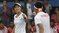 Ganda campuran tenis Indonesia, Christopher Rungkat dan Aldila Sutjiadi meraih medali emas SEA Games 2019. (Bola.com/Muhammad Iqbal Ichsan)