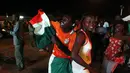 Di Abidjan, Pantai Gading, kemenangan Didier Drogba dkk di laga penyisihan Piala Dunia 2014 Grup C disambut meriah ratusan suporter, (15/6/2014). (REUTERS/Luc Gnago) 