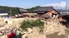 Begini lah kondisi porak poranda Jepang usai diterjang banjir bandang dan tanah longsor yang menewaskan sedikitnya 180 orang.