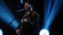 Ekspresi penyanyi sekaligus aktor Justin Timberlake saat tampil di Brit Awards 2018 di London, Rabu (21/2). (Joel C Ryan / Invision / AP)