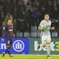 Striker Celta Vigo, Iago Aspas, melakukan selebrasi usai mencetak gol ke gawang Barcelona pada laga La Liga di Stadion Balaidos, Rabu (18/4/2018). Celta Vigo bermain imbang 2-2 dengan Barcelona. (AP/Lalo R. Villar)