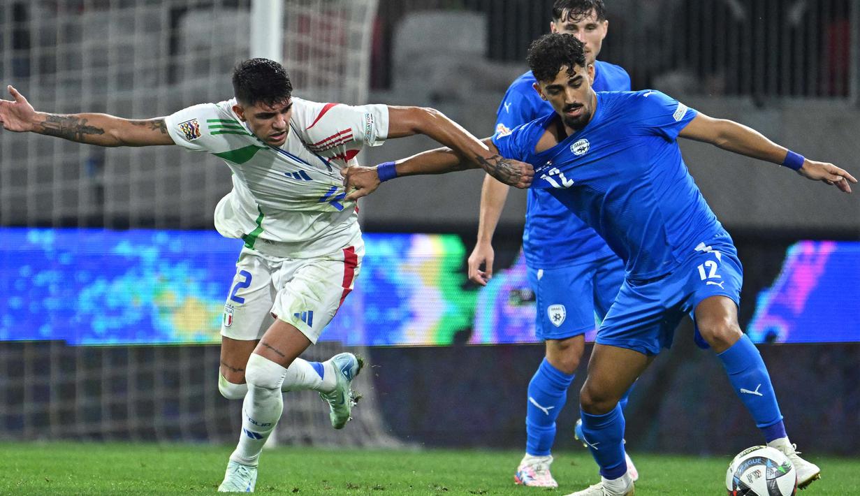 Menumbangkan Israel, Italia tetap berada di puncak klasemen Grup 2 League A dengan enam poin dari dua laga. (Attila KISBENEDEK/AFP)