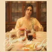 Poster single baru Raisa berjudul Nyaman Tak Cukup (YouTube/Raisa).
