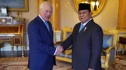 Di Inggris, Presiden Prabowo Subianto dijadwalkan mengadakan sejumlah pertemuan, termasuk bertemu Raja Charles III. (Jonathan Brady/POOL/AFP)