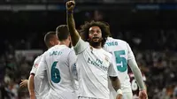 Pemain Real Madrid, Marcelo merayakan golnya ke gawang Eibar pada lanjutan La Liga Santander di Santiago Bernabeu stadium, Madrid, (22/10/2017). Madrid menang 3-0. (AFP/Pierre-Philippe Marcou)