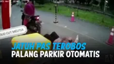 EMAK-EMAK TEROBOS PALANG PARKIR OTOMATIS, EH YANG DIBONCENG JATUH