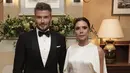 <p>Dress dengan detail unik hadirkan pesona yang menjanjikan. Kali ini ia tampil dengan aksen draperry pada bagian perut dan aksen cutting lengan yang begitu unik. [Foto: Instagram/ Victoria Beckham]</p>