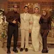 Aurel Hermansyah kompak bersama Atta mengenakan baju coklat. Aurel tampil dengan long dress lengan panjang shining dipadukan kerudung coklat polos. [@aurelie.hermansyah]