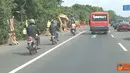 Citizen6, Jakarta: Tiga sepeda motor masuk Jalan Tol. Motor ini terlihat bersama rombongan pengantar jenazah, masuk dari arah UKI Cawang, dan keluar di Pintu Tol Cibubur 1, Minggu (10/4) siang.(Pengirim: Adrianto)