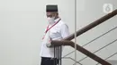 Bupati Hulu Sungai Utara (HSU) Kalimantan Selatan, Abdul Wahid usai diperiksa penyidik di Gedung Merah Putih KPK, Jakarta, Jumat (1/10/2021). Abdul Wahid diperiksa sebagai saksi terkait dugaan suap pengadaan barang dan jasa di Kabupaten Hulu Sungai Utara, Kalsel. (Liputan6.com/Helmi Fithriansyah)