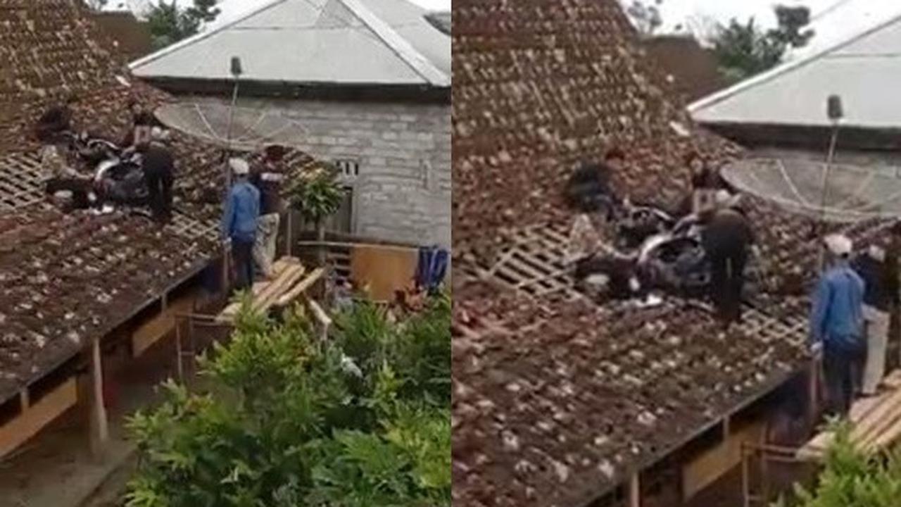Diduga Rem Blong, Motor Ini Malah Terbang Nyangkut di Atas Genteng Warga