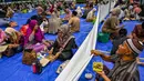 Berbuka puasa bersama juga menjadi ajang merajut tali silaturahmi dengan sesama umat Muslim. (Juni KRISWANTO/AFP)