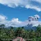 Gunung Dukono di Halmahera Utara, Maluku Utara, kembali erupsi pada Jumat siang (12/6/2026). (Liputan6.com/ Dok PVMBG)