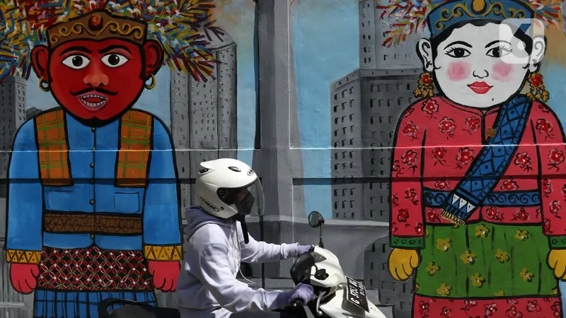 FOTO: Mural Bertemakan Kota Jakarta Jadi Media Edukasi dan Penghias Jalan