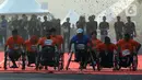 Disabilitas pengguna kursi roda mengikuti kegiatan lomba lari bertajuk Lo Gue Run (LGR) 2020 di Kompleks Monas, Jakarta Pusat, Minggu (26/1/2020). Kodam Jayakarta menggelar lomba lari 'Loe Gue Run' yang merupakan puncak perayaan HUT ke-70 Kodam Jaya. (Liputan6.com/Johan Tallo)