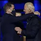 Presiden terpilih Amerika Serikat Joe Biden (kanan), bersama putranya, Hunter Biden (kiri). (Photo credit: AP Photo/Andrew Harnik, Pool)