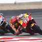 Marc Marquez (depan) dan Andrea Dovizioso. (Motorsport)