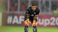 Kiper Persija Jakarta, Andritany saat melawan Tampines Rovers pada laga Piala AFC 2018 di Stadion Utama GBK, Senayan, Jakarta (28/2/2018). Persija menang 4-1. (Bola.com/Nick Hanoatubun)