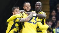 Para pemain Watford merayakan gol Joshua King dalam lanjutan Liga Inggris 2021/2022, Sabtu (20/11/2021) malam WIB di Stadion Vicarage Road. (AP Photo/Frank Augstein)