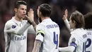 Cristiano Ronaldo dan para pemain Real Madrid merayakan gol saat melawan Napoli pada laga 16 besar Liga Champions di Santiago Bernabeu stadium, Madrid (15/2/2017). Madrid menang 3-1. (AFP/Javier Soriano)