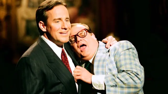 Phil Hartman (kiri) bersama Chris Farley (kanan) dalam sketsa komedi "Saturday Night Live" pada 14 May 1994. (NBCUniversal)