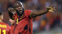 Romelu Lukaku tercatat telah melesatkan gol sebanyak lima kali ditambah satu assist dari empat pertandingannya bersama Belgia. Ia menempati urutan kelima daftar pencetak gol terbanyak kualifikasi Piala Dunia 2022. (Foto: AFP/John Thys)