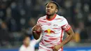 Steven Nkunku. Striker RB Leipzig ini menjadi satu-satunya penghuni barisan top skor sementara Liga Champions yang gagal lolos ke babak 16 Besar. Catatan 7 golnya terhenti usai RB Leipzig finis di posisi ketiga Grupa A meski di laga terakhir menang 2-1 atas Manchester City. (AFP/Belga/Bruno Fahy)