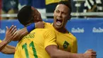 Penyerang Brasil, Neymar merayakan gol yang dicetak Gabriel Yesus saat malawan Denmark di penyisihan Grup A Olimpiade 2016 di Fonte Nova Stadium, Salvador, Brasil, (11/8). Brasil menang atas Denmark dengan skor 4-0. (AFP PHOTO/NELSON Almeida)