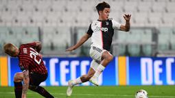 2. Paulo Dybala. Striker Juventus ini mengenakan kaos kaki rendah untuk menunjang mobilitas kecepatannya di lapangan yang mampu meliuk-liuk, sehingga banyak orang menyebutnya sebagai "Messi Baru". (AFP/Miguel Medina)