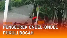 Terekam kamera CCTV seorang oknum pengecrek ondel-ondel lakukan pemukulan terhadap seorang bocah viral di media sosial.