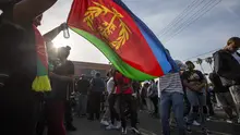 Ilustrasi bendera Eritrea. (David McNew/Getty Images/AFP)