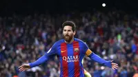 Striker Barcelona Lionel Messi merayakan gol ke gawang Osasuna  (AP Photo/Manu Fernandez)