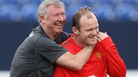 Sir Alex Ferguson (kiri) dan Wayne Rooney (kanan) saat masih berkarier di Manchester United. (Sky Sports). 