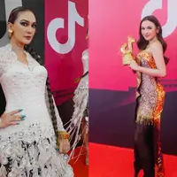 Luna Maya dan Mahalini turut hadir dalam gelaran TikTok Awards 2023. Kedua perempuan berdarah Bali itu tampil menawan dengan sentuhan kain tradisional. Siapa yang paling menawan? [@lunamaya @mahaliniraharja]