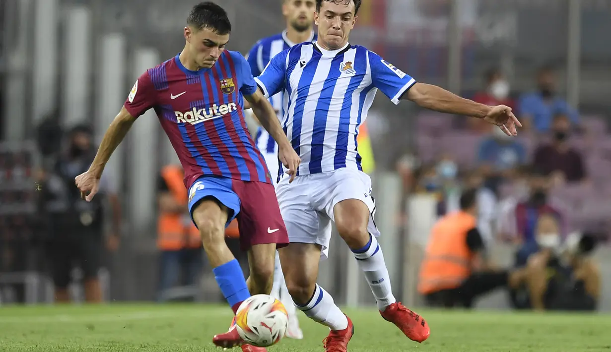 Pedri merupkan pemain muda berbakat Barcelona yang menempati urutan kedua pemain berbanderol tertinggi, yaitu 80 juta euro. Namun bisa saja ia bernasib sama dengan sang bintang Barcelona, Lionel Messi yang tidak diperpanjang oleh klub dan meninggalkan Blaugrana secara gratis. (Foto: AFP/Josep Lago)