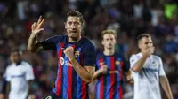 Robert Lewandowski mencetak hat-trick saat Barcelona mengalahkan Viktoria Plzen 5-1 pada pertandingan pembuka Grup C Liga Champions di&nbsp;Stadion Spotify Camp Nou, Kamis (8/9) dini hari WIB. (AP Photo/Joan Monfort)