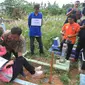 Lokasi penguburan jasad AP, PNS Palembang di TPU Kandang Kawat Palembang (Liputan6.com / Nefri Inge)