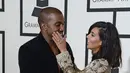 Hubungan intim Kanye West dan Kim Kardashian menjadi jauh lebih menarik dan ‘panas’ untuk mereka ketika Kim hamil. Kanye bahkan mengatakan bahwa dia ingin Kim hamil sepanjang tahun. (Bintang/EPA)