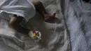 Seorang bayi yang baru lahir beristirahat di tempat tidur Rumah Sakit Anak Saint Damien Port-au-Prince, Haiti, Minggu (24/10/2021). Dilanda krisis, rumah sakit pediatri utama ibu kota hanya memiliki bahan bakar yang tersisa 3 hari untuk menjalankan ventilator dan peralatan medis. (AP/Matias Delacroi