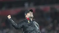 Manajer Liverpool, Jurgen Klopp, merayakan gol Divock Origi dengan berlari ke tengah lapangan. (AP Photo/Jon Super)