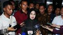 Sylviana Murni memberi keterangan usai menjalani pemeriksaan Dir Tipikor Bareskrim Polri, Jakarta, Rabu (2/1). Ia diperiksa sebagai saksi dugaan korupsi dana hibah Kwarda Pramuka DKI Jakarta TA 2014-2015. (Liputan6.com/Helmi Fithriansyah)