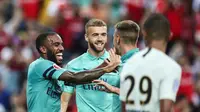 Arsenal mengalahkan Paris Saint-Germain pada International Champions Cup 2018 di Stadion Nasional, Singapura, Sabtu (28/7/2018). (AP Photo/Yong Teck Lim)