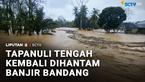 Banjir bandang kembali menerjang wilayah Tapanuli Tengah, Sumatra Utara, pada Senin siang. Banjir merendam permukiman dan membawa kayu gelondongan.