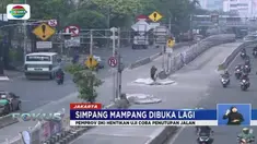 Uji coba penutupan tiga simpang di Mampang Prapatan, Jakarta Selatan dihentikan lantaran warga menilai penutupan merugikan.