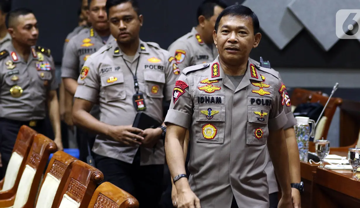 Kabareskrim Komjen Idham Azis bersiap menjalani Uji Kepatutan dan Kelayakan di Komisi III DPR, Kompleks Parlemen, Senayan, Jakarta, Rabu (30/10/2019). Idham Azis merupakan calon tunggal Kapolri yang ajukan Presiden Jokowi menggantikan Kapolri sebelumnya Tito Karnavian. (Liputan6.com/Johan Tallo)
