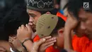 Raut wajah tersangka saat dihadirkan dalam rilis Operasi Cipta Kondisi jelang Asian Games 2018 di Polda Metro Jaya, Jakarta, Jumat (13/7). (Merdeka.com/Imam Buhori)