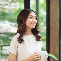 ilustrasi perempuan tersenyum/Makistock/Shutterstock