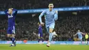 Gelandang Manchester City Phil Foden merayakan gol pembuka untuk timnya ke gawang Leeds United dalam laga pekan ke-17 Liga Inggris di Etihad Stadium, Rabu (15/12/2021) dini hari WIB. Manchester City mencukur tamunya Leeds United tujuh gol tanpa balas. (AP Photo/Jon Super)