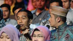  Jokowi memberikan komentarnya terkait ajang pencarian bakat di perhelatan Malam Puncak Putri Muslimah Indonesia 2014 di TMII, Jakarta, Rabu (28/5/2014) (Liputan 6.com/Andrian M Tunay)